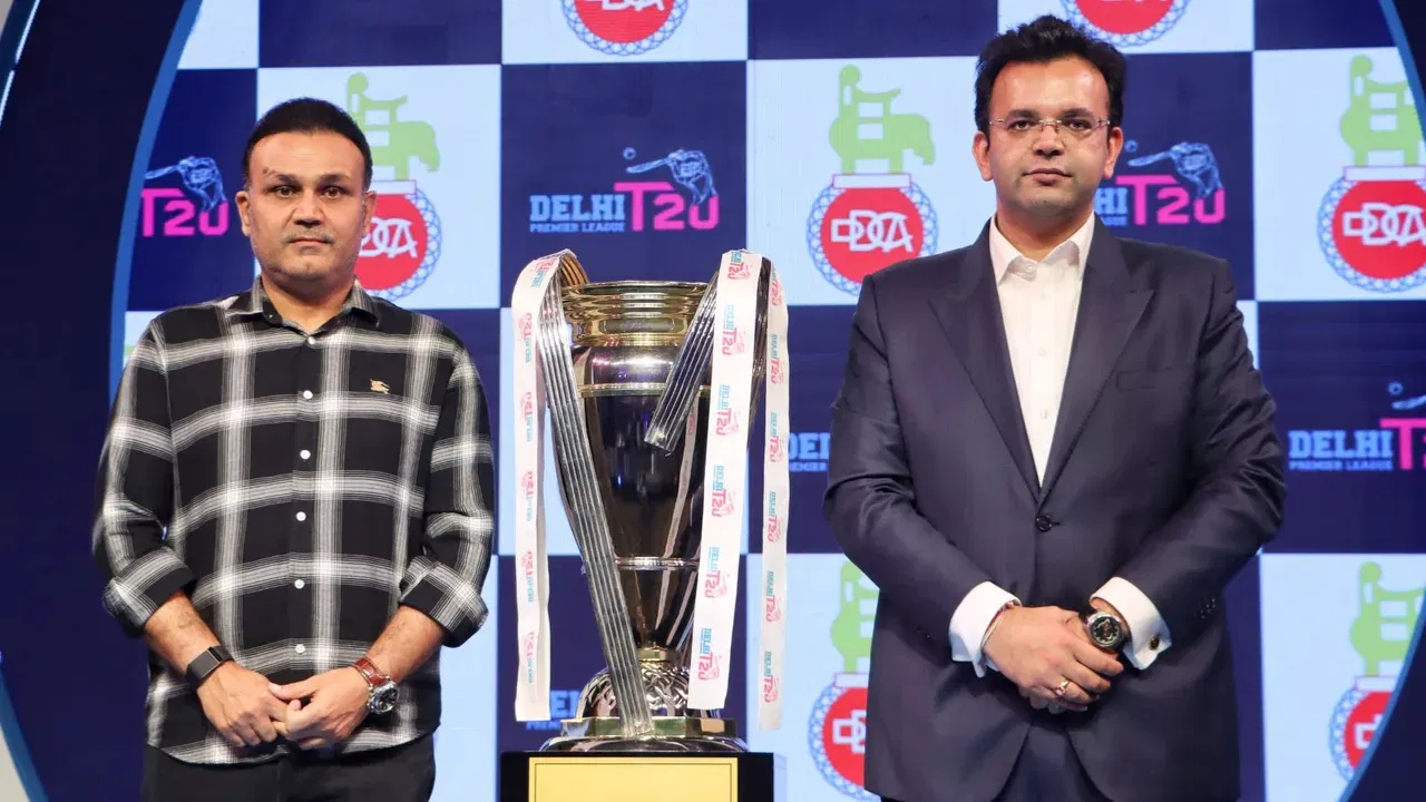 Virender Sehwag and Rohan Jaitley with DPL Trophy