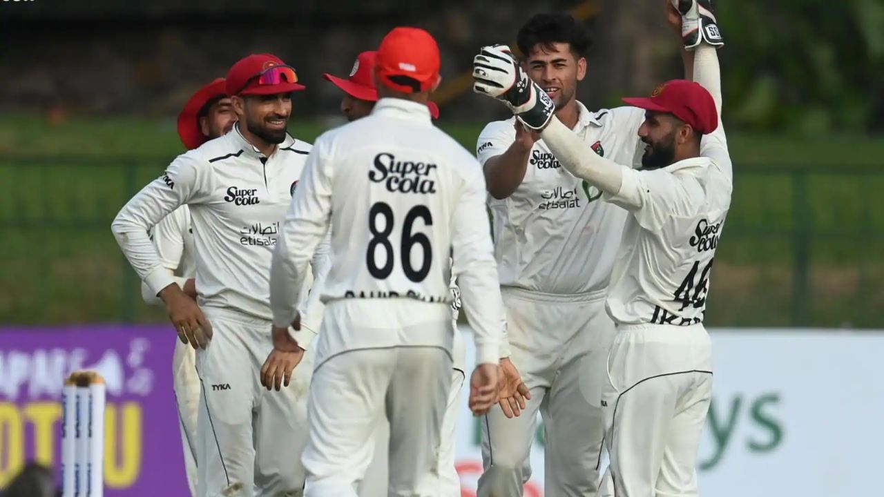 Naveed Zadran celebrates with teammates