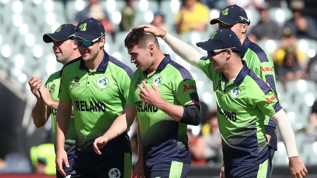 Hat Trick Taker Josh Little Is Congratulated By His Team Mates