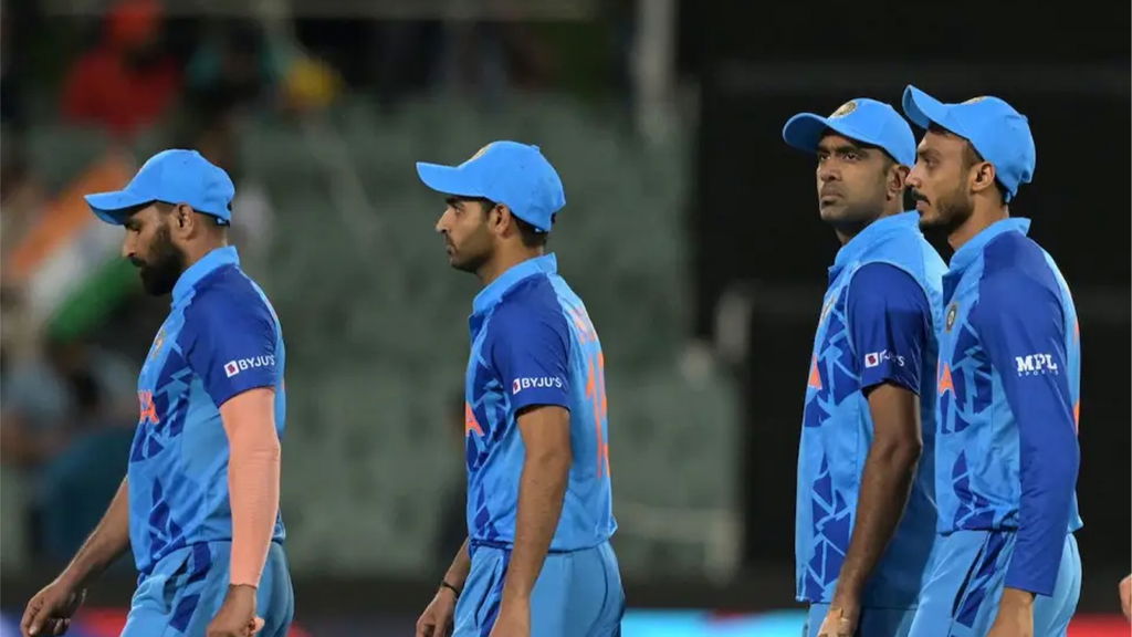 India's Bowlers Walk Out Dejectedly