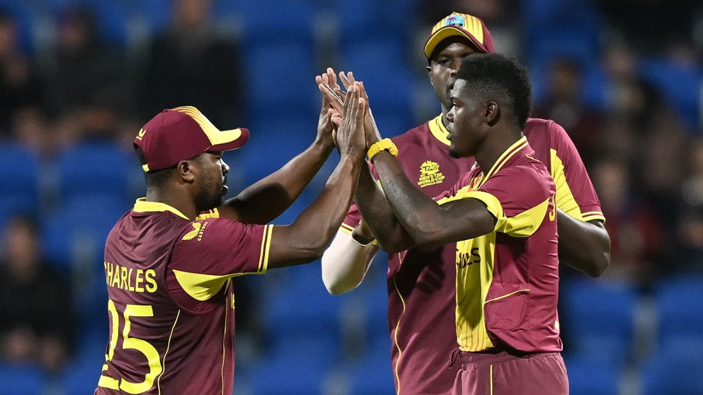 Alzarri Joseph Celebrates With Team Mates After Getting Regis Chakabva