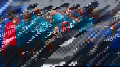 Ish Sodhi is congratulated after getting the wicket of Gerhard Erasmus