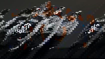 New Zealand's players celebrate after Babar Azam's dismissal