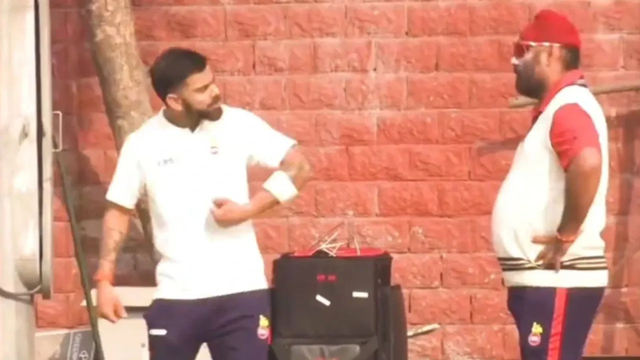 Virat Kohli and Sarandeep Singh