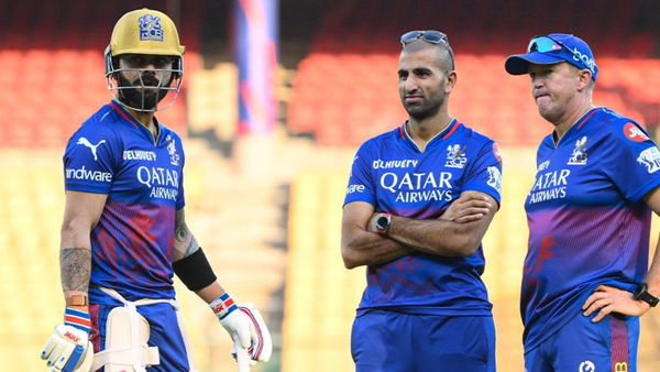 Virat Kohli with Mo Bobat and Andy Flower
