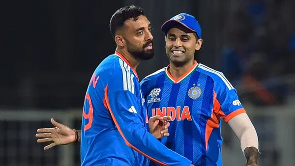 Suryakumar Yadav with Varun Chakravarthy