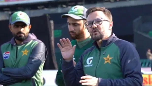 Pakistan batter Babar Azam and Mike Hesson