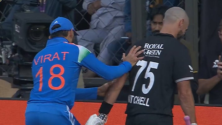 Virat Kohli and Daryl Mitchell