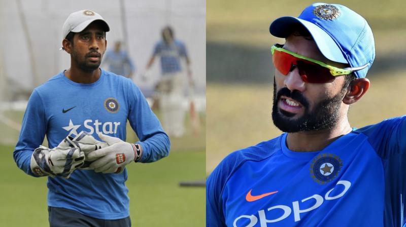 Wriddhiman Saha and Dinesh Karthik . Credits: Twitter