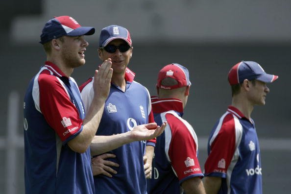 Andrew Flintoff of England with Troy Cooley the England bowling coach. (Photo by Tom Shaw/Getty Images)