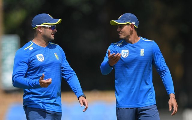 South Africa wicketkeeper Quinton de Kock (r) chats with coach Mark Boucher during South Africa nets at The Wanderers. (Photo by Stu Forster/Getty Images)