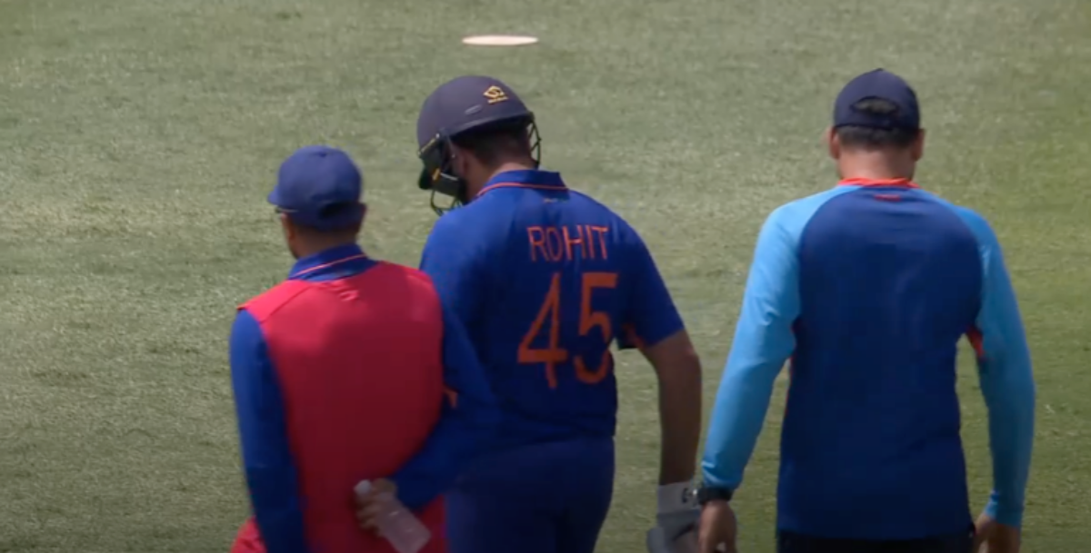 Rohit Sharma walks off the field