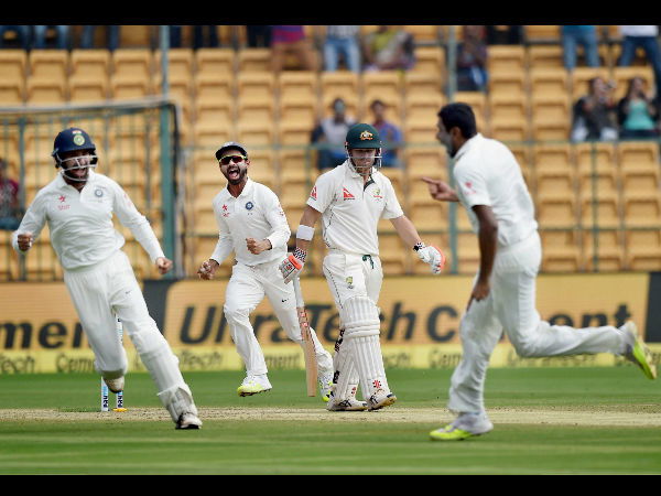 Ravichandran Ashwin and David Warner