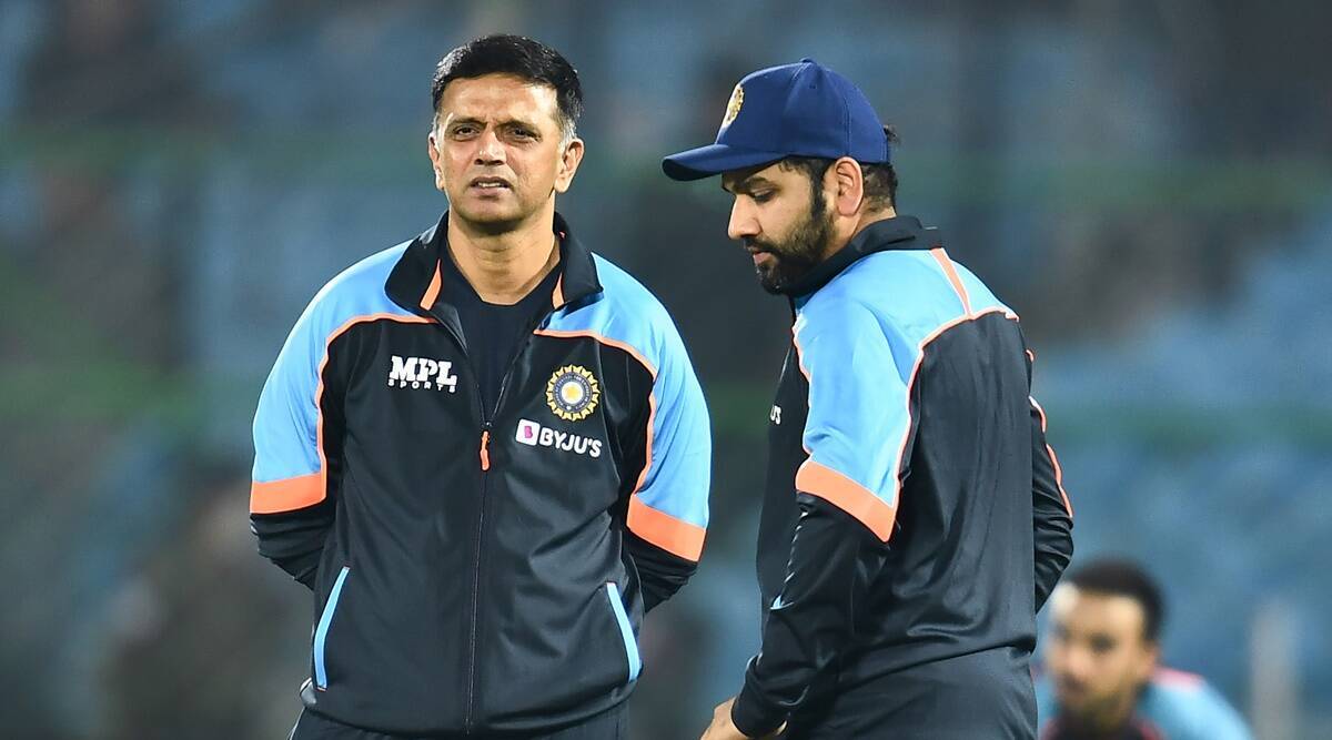 Rahul Dravid alongside Rohit Sharma