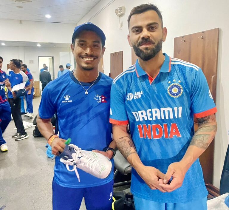 Sompal Kami with Virat Kohli