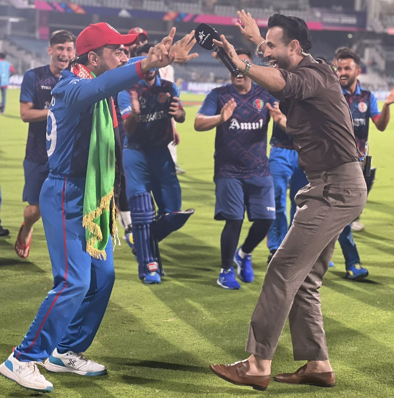 Irfan Pathan and Rashid Khan {PC:X}