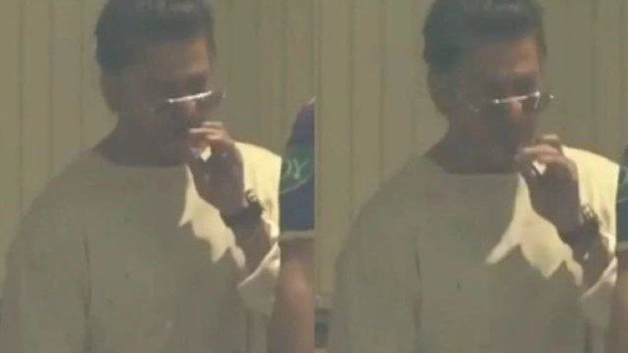 Shah Rukh Khan smoking during IPL match